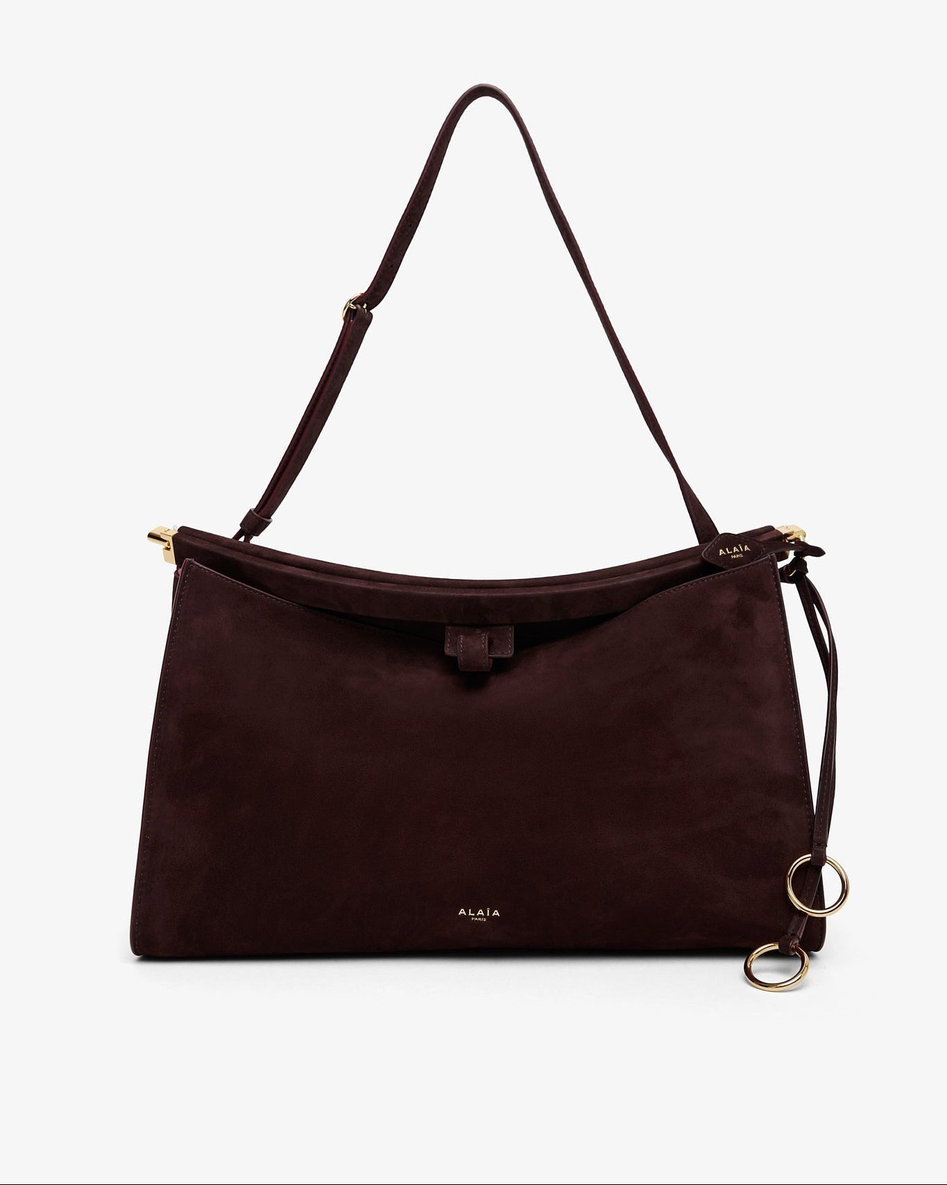 Brown handbag with a strap on a white background