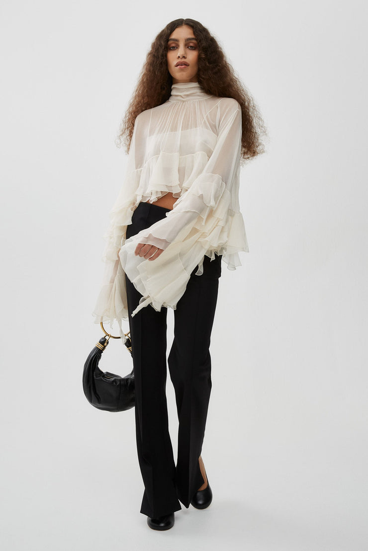 High-low white ruffle top in silk mousseline