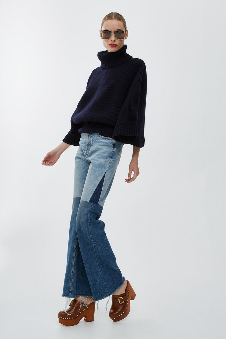 Short dark blue turtleneck cape