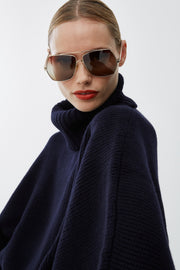 Short dark blue turtleneck cape