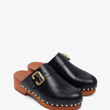 Jeannette black leather clogs