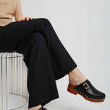 Jeannette black leather clogs