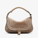 Beige handbag with gold accents on a white background