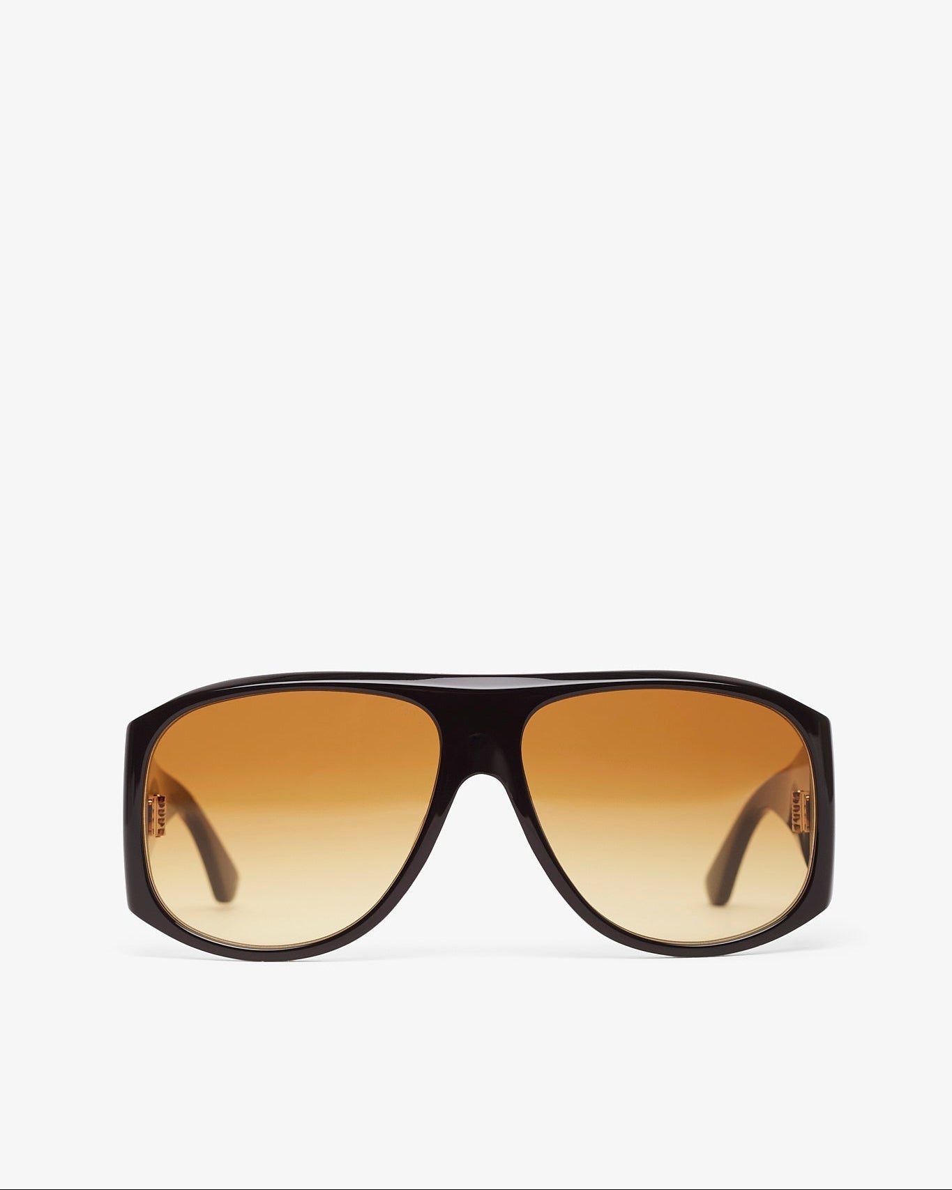 Sunglasses with a black frame and brown gradient lenses on a white background