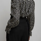 Polka dot high neck silk blouse