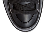 Who Runs black leather boots