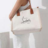 Nastroloubi E/W large natural canvas tote bag