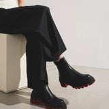 Marchacroche black leather ankle boots