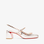 Clear high-heeled shoes with studded details on a white background
