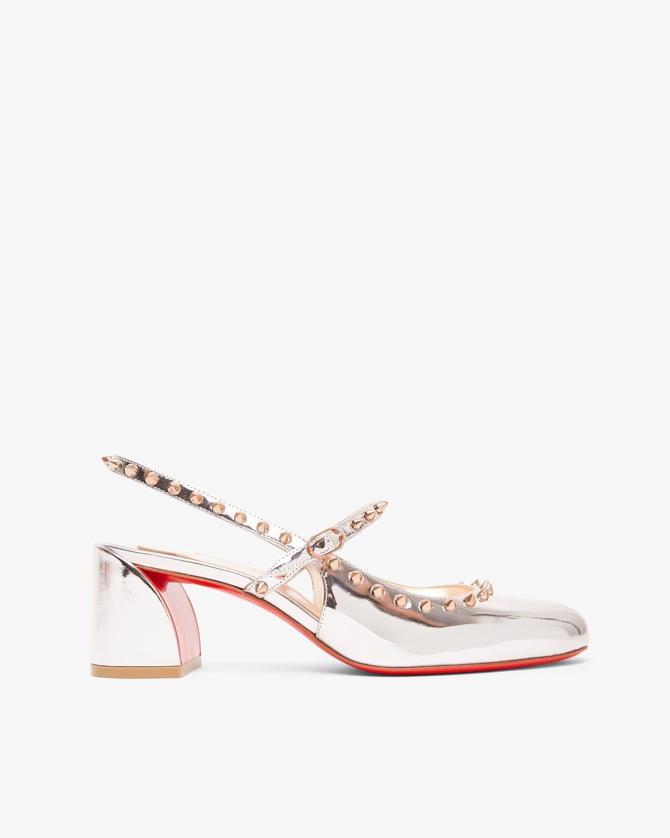 Clear high-heeled shoes with studded details on a white background