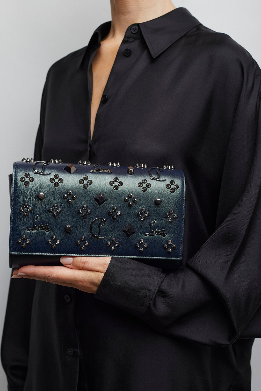 Christian Louboutin | Paloma dark green leather clutch | Savannahs