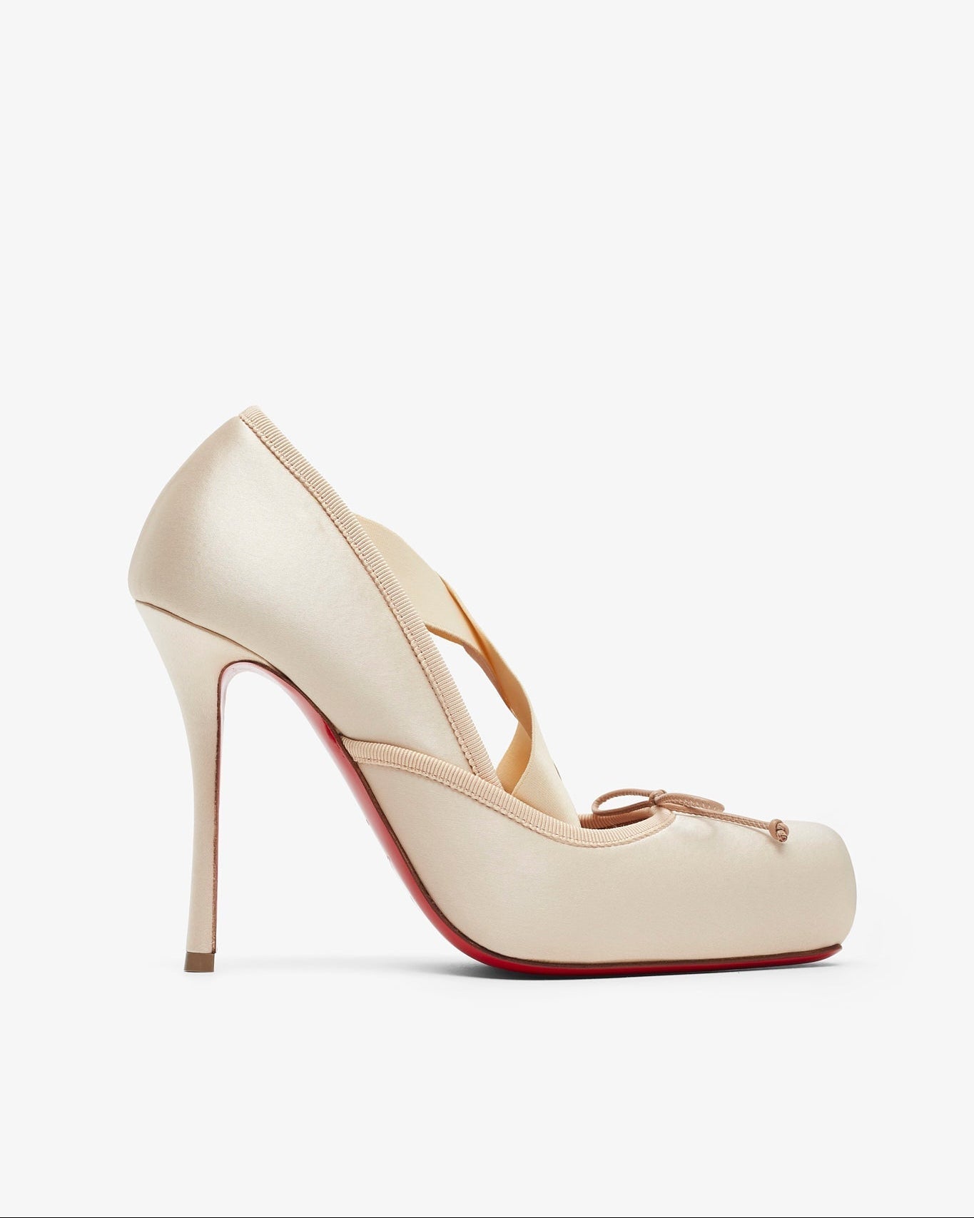 Beige high-heeled shoe on a white background