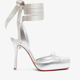 Silver high-heeled sandal with ribbon detail on a white background