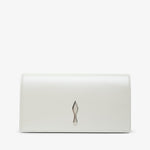 Pointed-toe shoe with beige leather sole and black heel on a white background