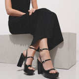 Voyou black patent sandals
