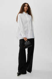 Oversized white shirt in poplin with open back