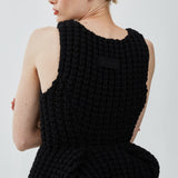 Slim fit peplum black top in waffle wool