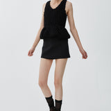 Slim fit peplum black top in waffle wool