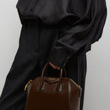 Antigona mini brown bag