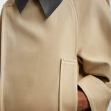 Short beige zipped jacket