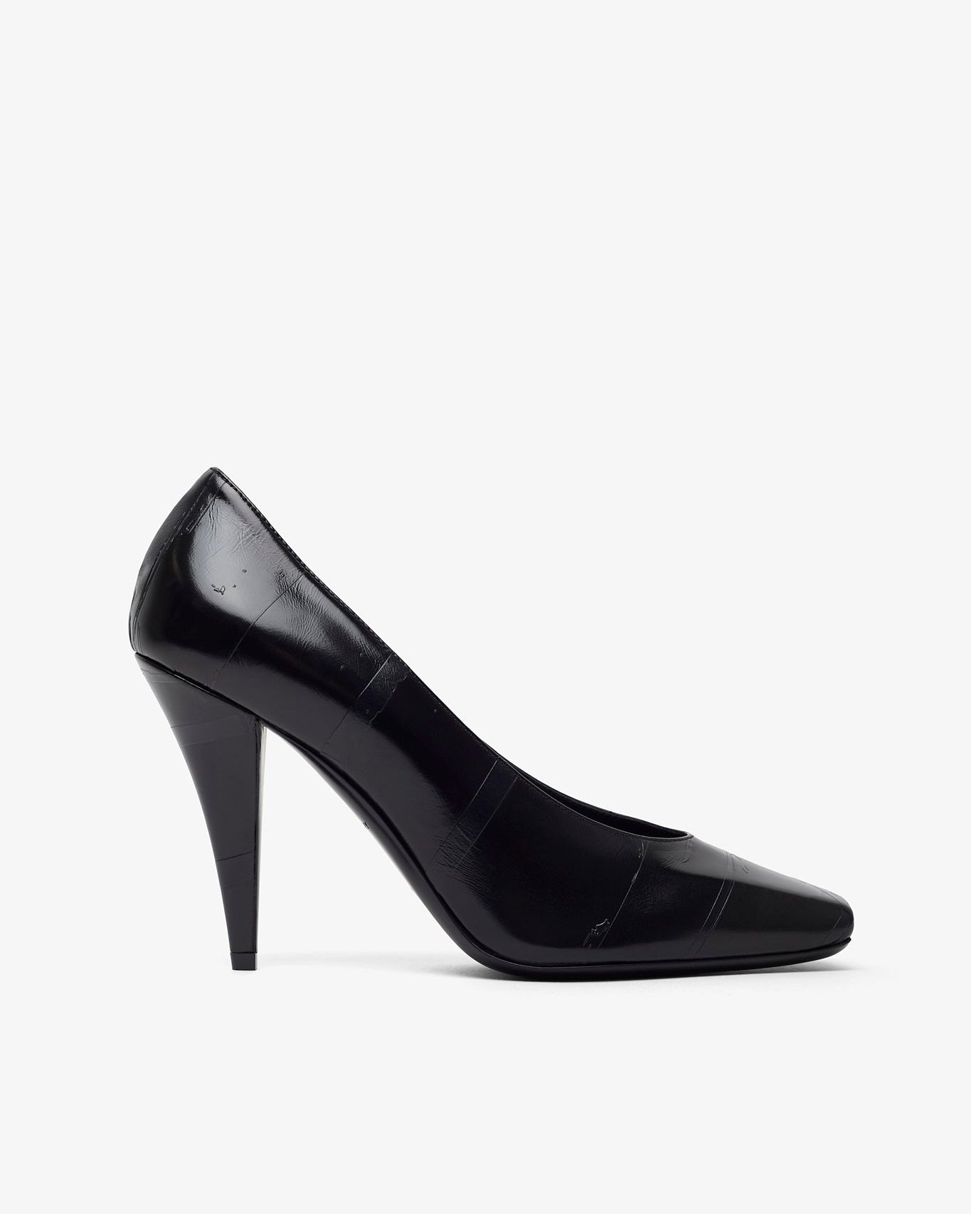 Black high-heeled shoe on a white background