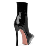 Yigit patent leather ankle boots