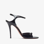 Black high-heeled sandal on a white background