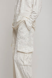 Liquid white cargo trousers