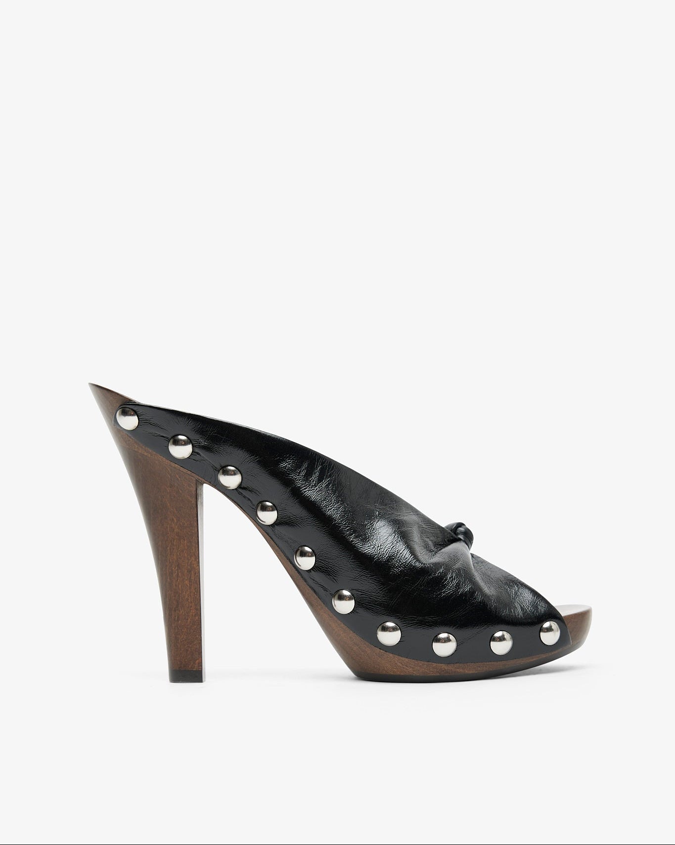 Black high-heeled shoe with studded details on a white background