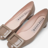 Roundy 25 beige patent pumps