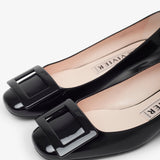 Roundy 25 black patent pumps