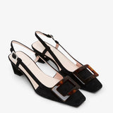 Belle Vivier black turtle sling backs