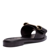 Isera black leather studded bow slide sandals