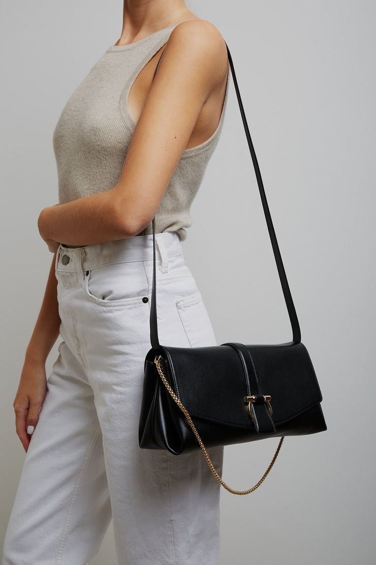 Front flap black crossbody bag