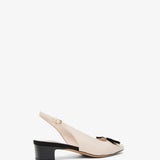 Iconic bow slingback pumps