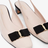 Iconic bow slingback pumps