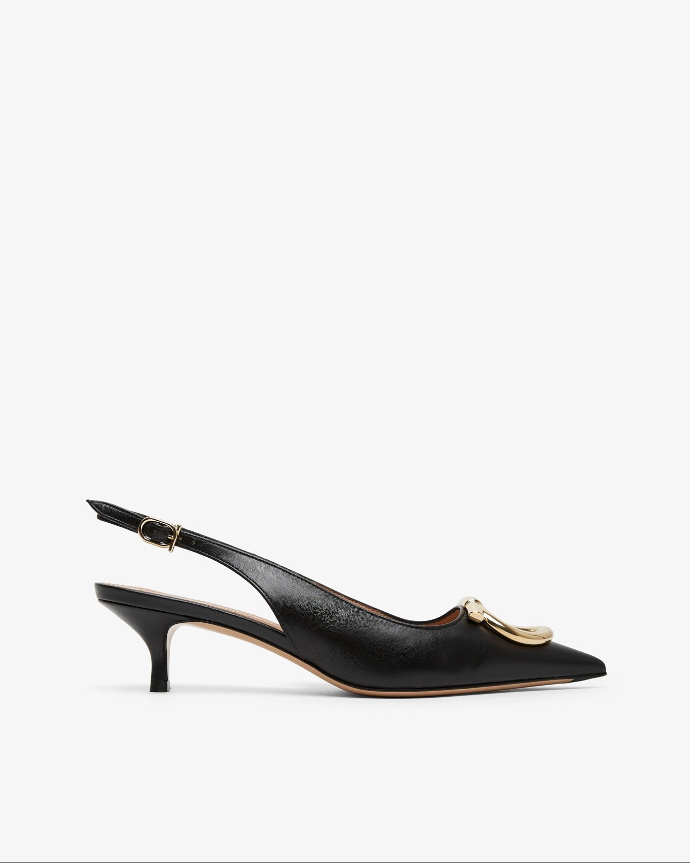 Black high-heeled shoes with a gold buckle on a white background
