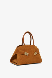 Hug S light brown suede top handle bag