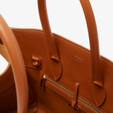 Hug S light brown suede top handle bag