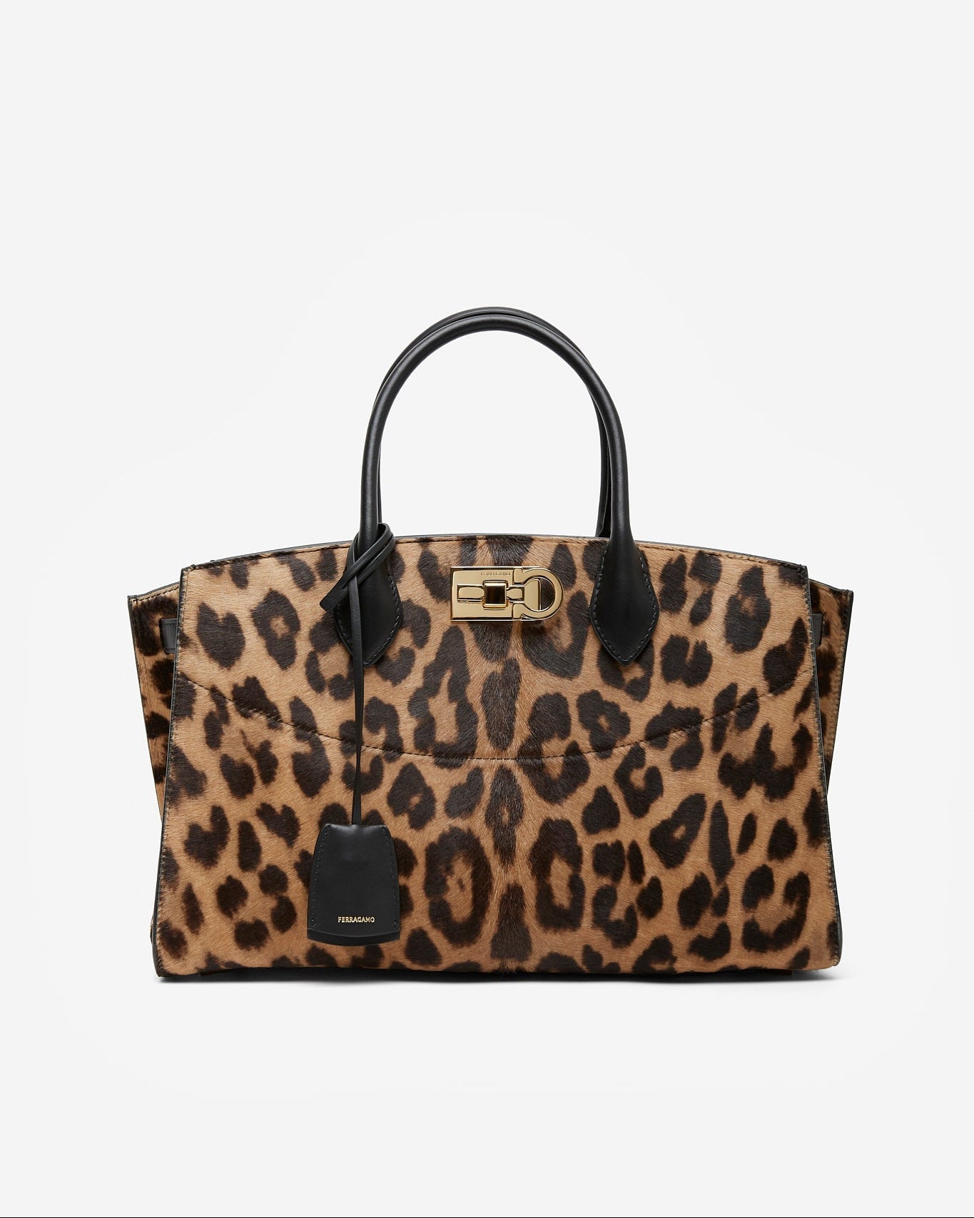 Leopard print handbag with black accents on a white background