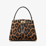 Leopard print handbag with a black handle on a white background