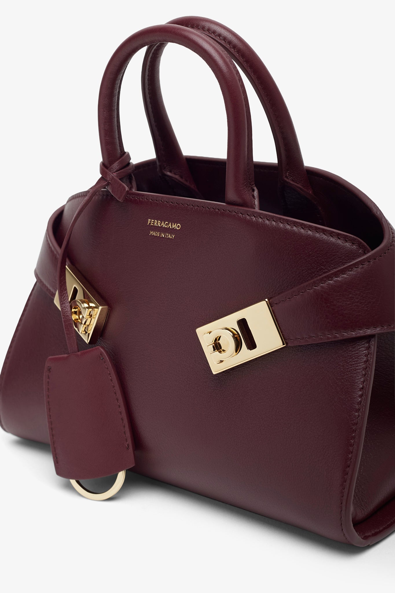 Hug mini soft plum top handle bag