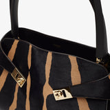 Hug small white and brown shoulder bag