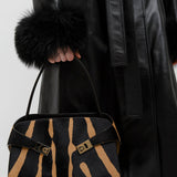 Hug small white and brown shoulder bag