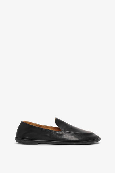 The Row | Canal black leather loafers | Savannahs