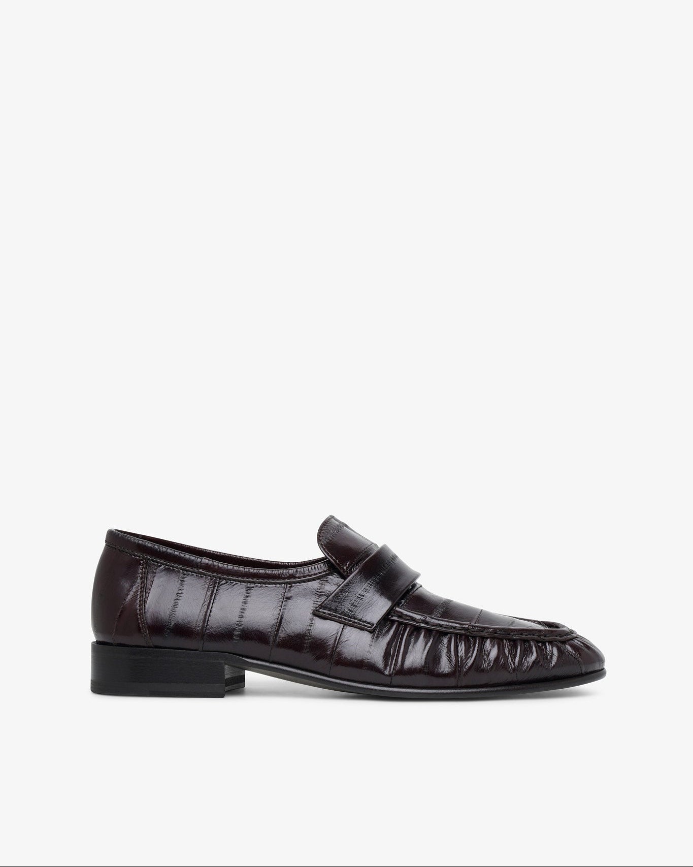 Dark brown leather loafer on a white background