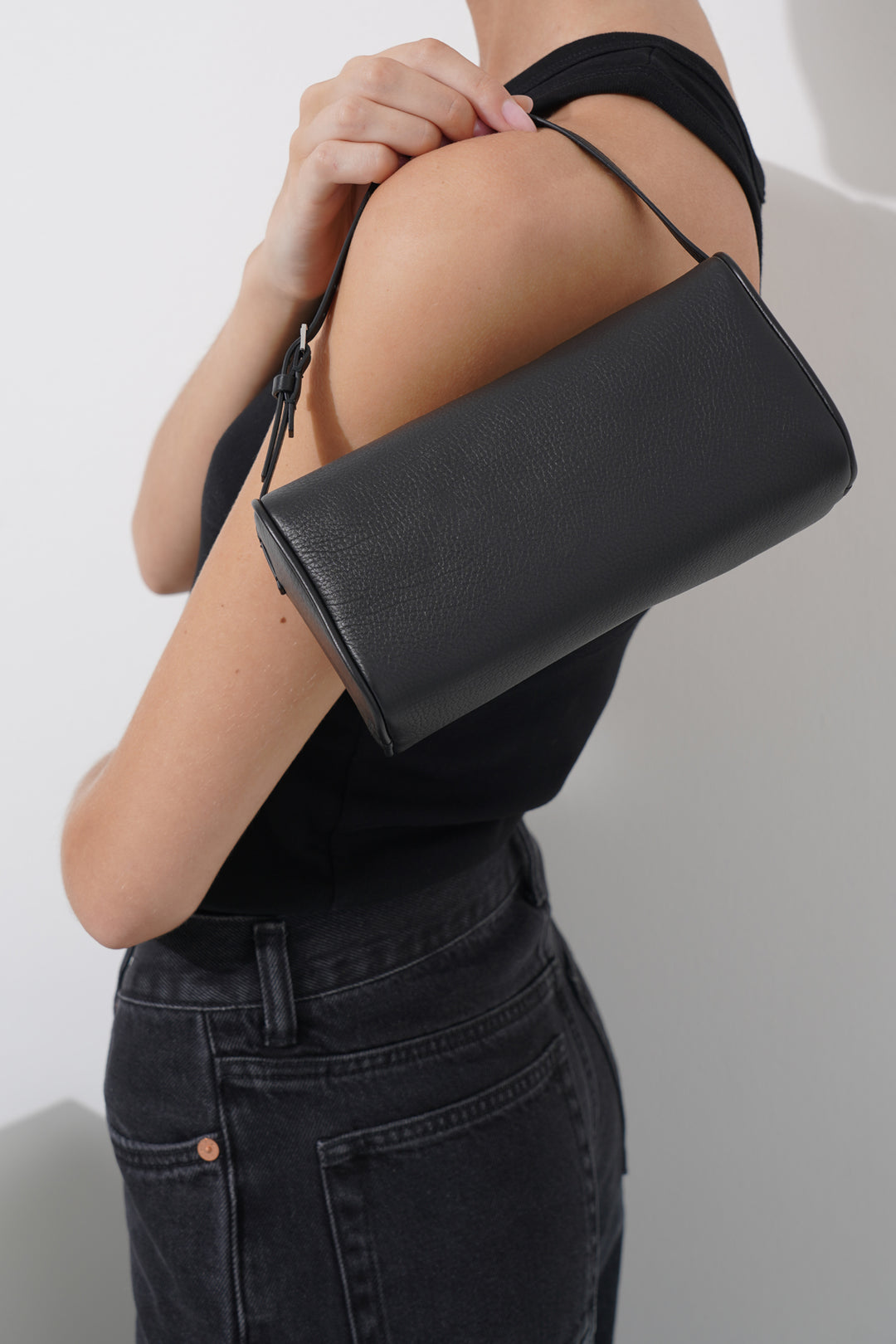 The Row | 90's black small grain leather bag | Savannahs