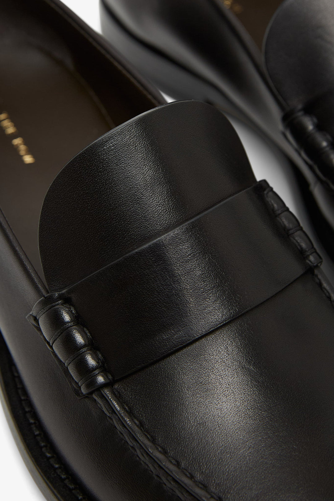 The Row | Novus black leather moccasin | Savannahs