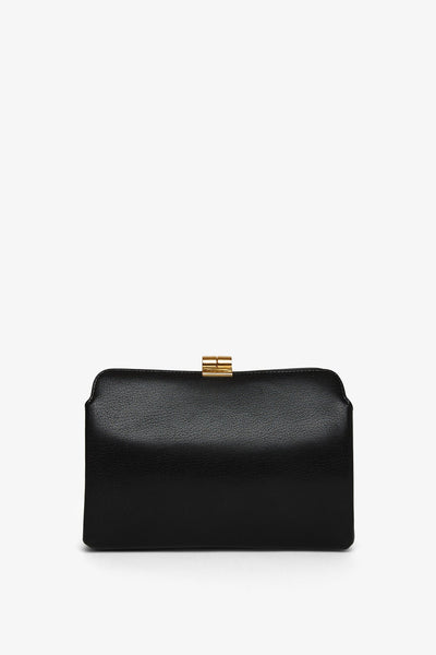 The Row | Amazon black shiny leather clutch | Savannahs