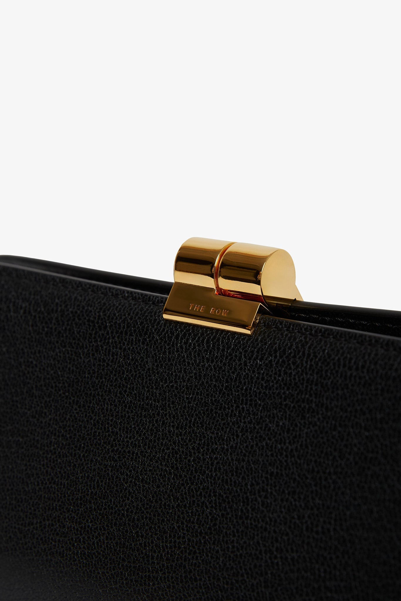 The Row | Amazon black shiny leather clutch | Savannahs